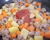 A picture of step 3 of My Gran's sausage and veg pie.