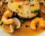 Foto del paso 7 de la receta Merluza a la vasca con langostinos