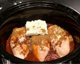 A picture of step 2 of Slow Cooker Creamy Chicken Enchilada Pasta.
