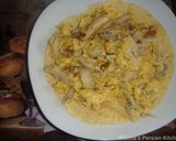 A picture of step 5 of Azerbaijani chicken- onion omelette.