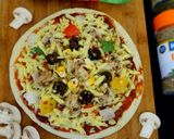 A picture of step 4 of Mushroom pizza.