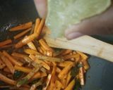 A picture of step 5 of Stir fry Carrot pickle with ginger.