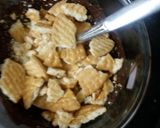 A picture of step 2 of Mariegold biscuits  cake.