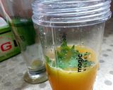 A picture of step 2 of Orange Mint Margarita.