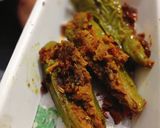 A picture of step 4 of Dana Methi stuffed Mirchi.