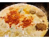 A picture of step 4 of Egg curry with bell peppers.