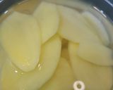 A picture of step 2 of Aloo ke pakore.