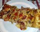 Foto del paso 13 de la receta: Empanada de hojaldre con bacon, cebolla, pimiento rojo, champiñones y nata para cocinar