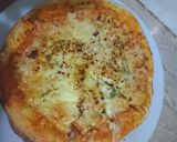 A picture of step 4 of Pizza cheese with egg.