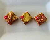 A picture of step 3 of How to use gold leaf with fondant.