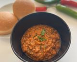 A picture of step 3 of Spicy Fava Beans with burger bun.