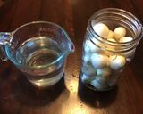 A picture of step 1 of California Farm Pickled Pearl Onions.