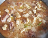 Foto del paso 4 de la receta: Paella de conejo y alcachofas