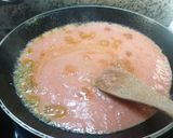 A picture of step 2 of Peppers in a tomato sauce.