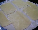 Foto del paso 2 de la receta: Palmeritas caseras con jamón y queso