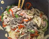 A picture of step 3 of Pork Belly and Vegetables Fry with much Peppers.