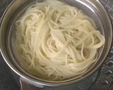 A picture of step 2 of Red sauce spaghetti.