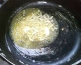 A picture of step 6 of Lasooni paneer.