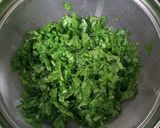 A picture of step 2 of PALAK TIKKI with gravy.