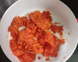 A picture of step 4 of Papaya ladu.