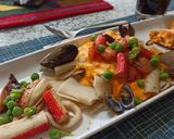 Foto del paso 5 de la receta: Guarguerones en crema marinera con Mariscos y arvejas
