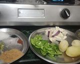 A picture of step 1 of Mirchi Baingan Salan.