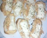 Foto del paso 4 de la receta: Tostadas de pollo y queso