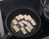 A picture of step 8 of Easy Mango Tofu Red Thai curry.