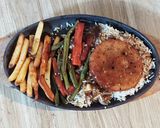 A picture of step 5 of Vegetable Sizzler in sizzler plate.