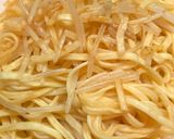 A picture of step 4 of Cheesy Baked Tiger Prawns with Yi Mein Noodles.