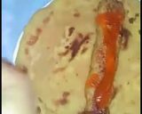 A picture of step 6 of Seekh kabab roll paratha.