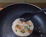 A picture of step 12 of Oats Uttapam.