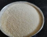 A picture of step 1 of Mix flour laddu.