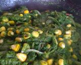 A picture of step 6 of Paalak Corn Rice.