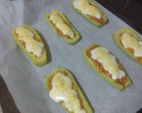 Foto del paso 7 de la receta: Calabacines gratinados y rellenos de jamón cocido y pipas