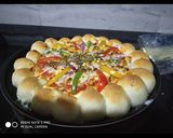 A picture of step 8 of Cheese bomb pizza.