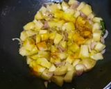 A picture of step 6 of Aloo Poha (Potato with Flattened Rice Pulao).