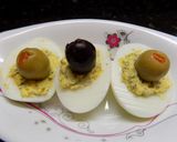 Foto del paso 4 de la receta: Huevos en canoa y huevos rellenos