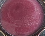 A picture of step 2 of Black currant and strawberry sauce.
