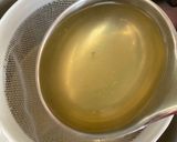 A picture of step 2 of Rice porridge with crab stock.