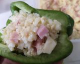 Foto del passaggio 5 della ricetta Peperoni ripieni al forno