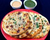 A picture of step 18 of Aloo walay nan.