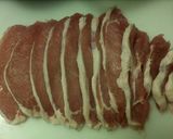 A picture of step 3 of Tender seasoned pork loin cuts.