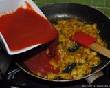A picture of step 6 of Eggplatns onions with tomato sauce.