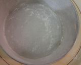 A picture of step 3 of Basbousa soaked in Orange & Honey syrup.
