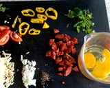 A picture of step 1 of My Chorizo Omelette with Cheese and herbs 🤗.