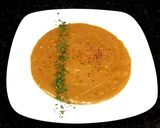 Foto del paso 4 de la receta: Crema de patatas azules con tomate - veggie