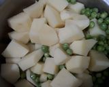 A picture of step 3 of Aloo matar gravy with jeera rice.