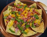 A picture of step 3 of Nachos with Meat and Peppers.