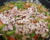 Foto del paso 4 de la receta: Arroz con conejo desmigado y verduras